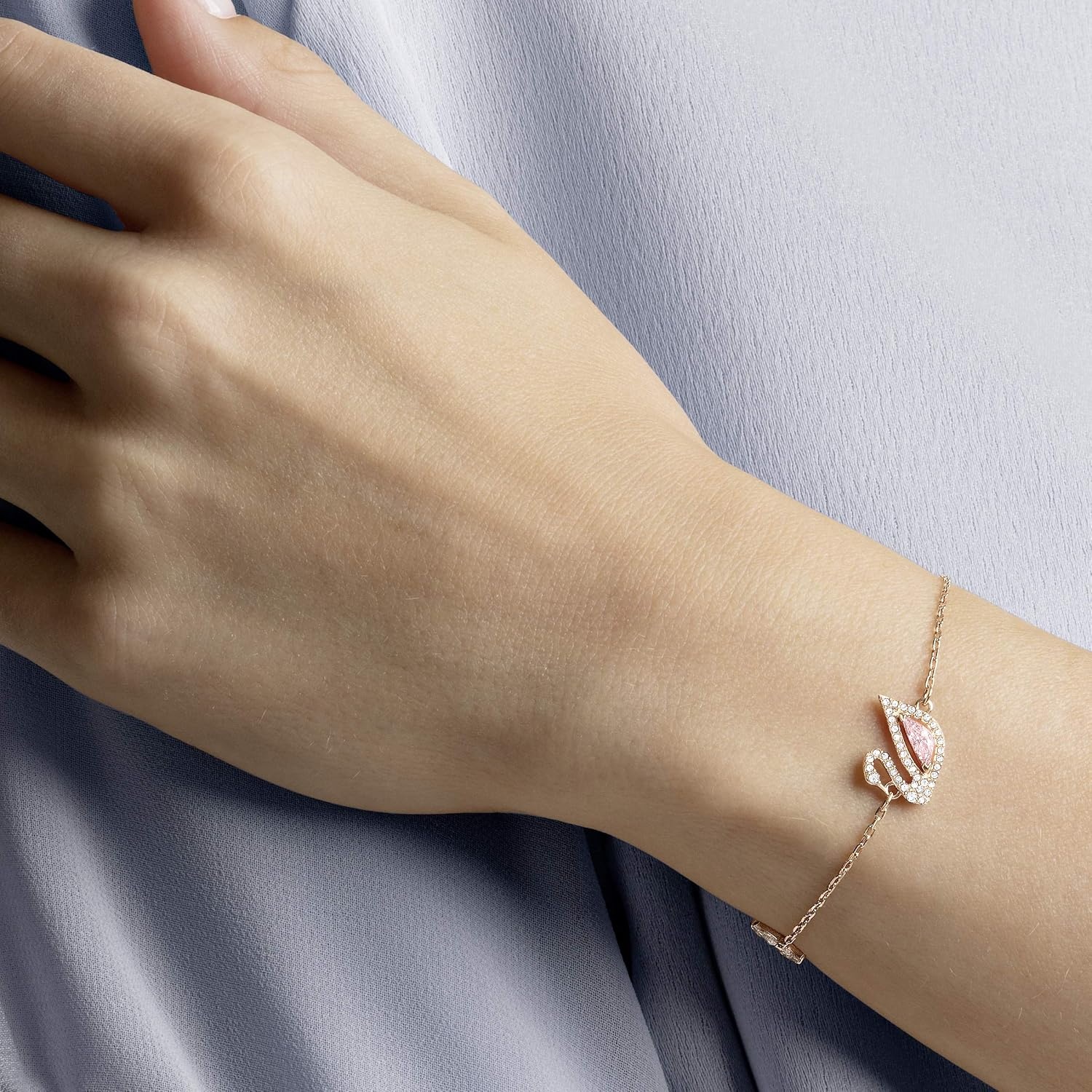 image:imageSwarovski Dazzling Swan Jewelry Collection Blue Crystals Pink Crystals Clear CrystalsBracelet Rose Gold Tone