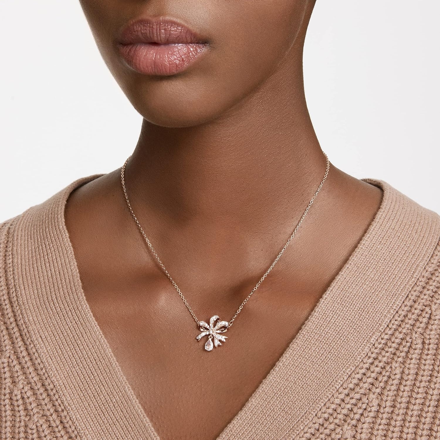 image:imageSwarovski Volta Necklace Earrings and Bracelets Jewelry Collection BowInspired Pink and Clear Crystals with RoseGold Tone FinishNecklace
